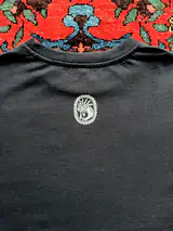 The Moltéa seal stamped at the back of the neck