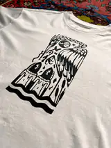 Close-up of the hand-pressed Misguided Care print on cotton
