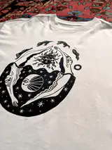Close-up of the hand-pressed In Cycles print on cotton