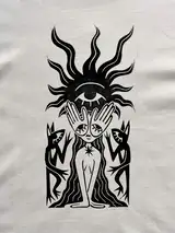Detail of the New Sight print on a off-white T-shirt